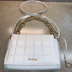 Bebe quilted white handbag. Like new. Large link gold chain & shoulder strap.